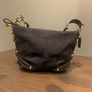 Black Coach Small Purse
9" (L) x 6" (H) x 4" (W)